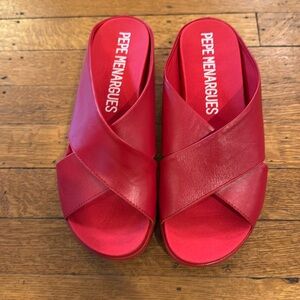 Brand new never worn red leather platform sandals. Made in Spain.!